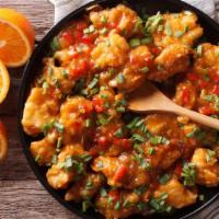 Sweet and Sour Chicken · A perfect balance of sweet and sour sauce drenched over our crunchy chicken breast bites.
