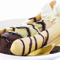 Banana Split Ice Cream · Delectable Banana Split Featuring Fresh Bananas, Strawberries & Fudge.