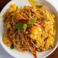Singapore Style Noodle · Burmese special, spicy. Rice noodle with prawns, chicken and pork with curry spices.