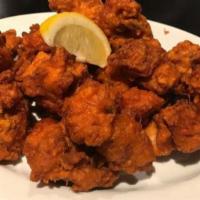 Chicken Pakoras · Tender boneless chicken, lightly spiced | Coated with chickpea flour and deep fried.