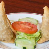 Samosa Vegetable (2 Pieces) · Crispy puffs filled with potato and green peas.