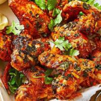 12. Tandoori Chicken Wings · Chicken wings marinated in yogurt with spices and cooked in clay oven.