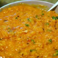 57. Dal (Yellow) · Lentils delicately spiced.