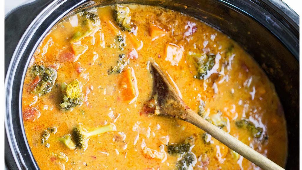 63. Vege Coconut Curry · Mixed vegetable in coconut curry sauce.
