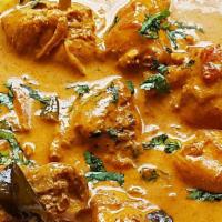 74. Chicken Coconut · Boneless chicken cooked in a coconut sauce and spices.