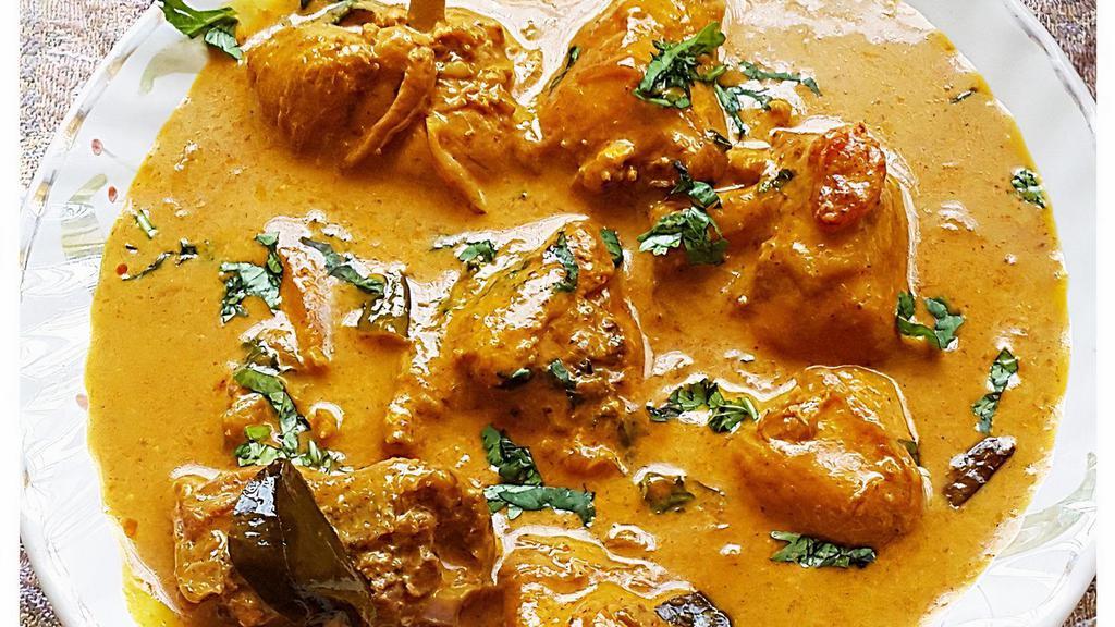 74. Chicken Coconut · Boneless chicken cooked in a coconut sauce and spices.