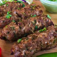 38. Ground Seekh Kabob · Fresh ground lamb with herbs and spices barbecued.