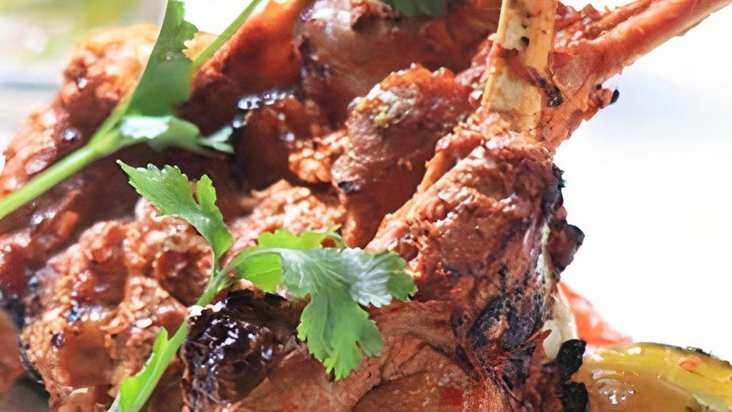 37C. Tandoori Lamb Chops (3) · Tender lamb chops marinade w/ herbs & grilled spices and grilled in tandoori (clay oven).