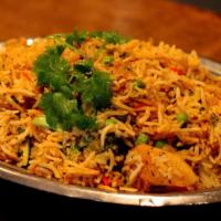 102. Star India Special Biryani · Basmati rice cooked with vegetables, fish, prawn, lamb and chicken.