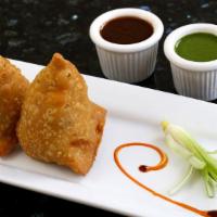Vegetable Samosa · Gluten. All time Indian favorite snack made with Indian pastry sheet stuffed with mildly spi...