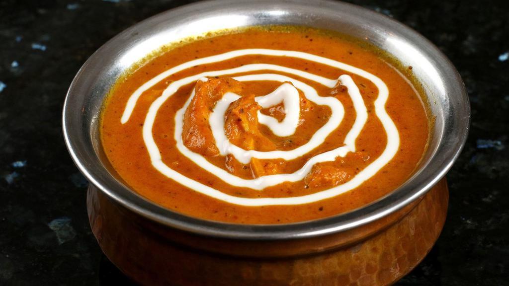 Chicken Curry · Dairy. Tender pieces of chicken cooked in mildly spiced onion-tomato sauce.