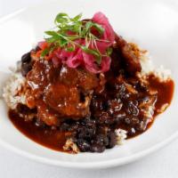 Pork Masitas · slow braised pork shoulder, white rice, black beans, pickled red onions & chilis, spicy pork...