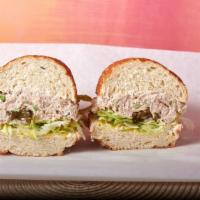 Tuna Sandwich · Served with mayonnaise, mustard, lettuce, tomatoes, onions, pickles, peppers, and jalapenos.
