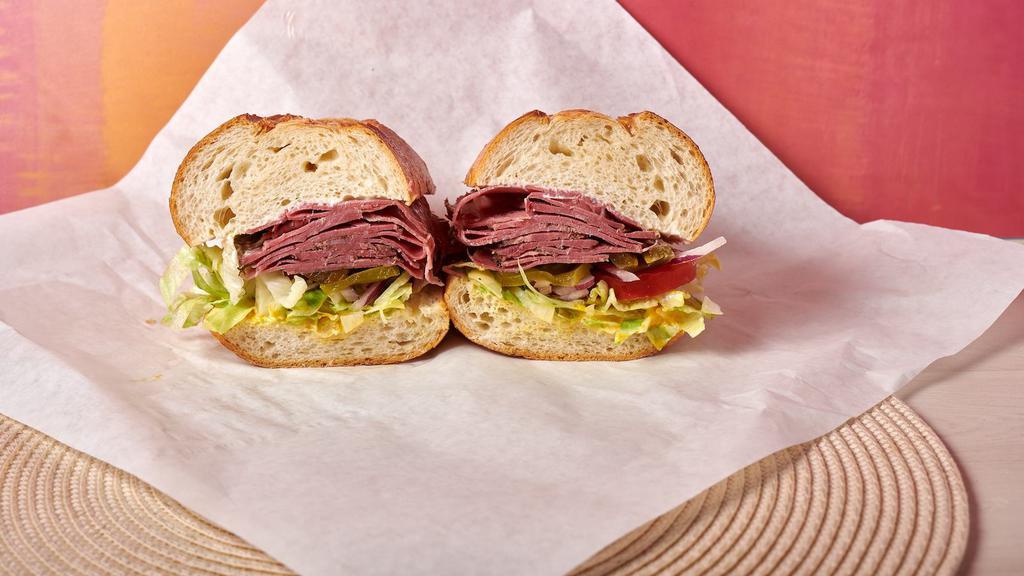Pastrami Sandwich · Served with mayonnaise, mustard, lettuce, tomatoes, onions, pickles, peppers, and jalapenos.