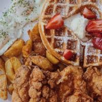 Breakfast Waffle Plate · Waffle, one piece fried chicken, two eggs, and golden crispy potatoes.