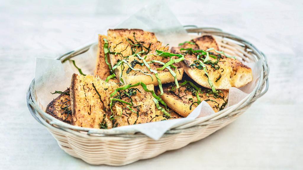 Garlic Bread - a Chef Manzo favorite · House-made bread, garlic butter, paprika and fresh basil. Vegetarian.