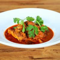 Chicken Tikka Masala · Roasted spicy chicken, tomato butter cream sauce