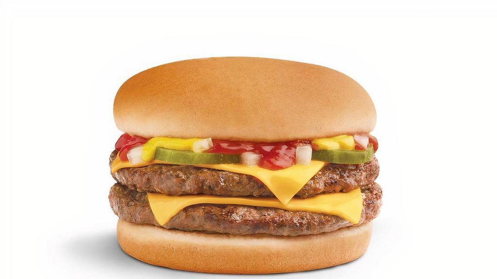 Double Cheeseburger · Two juicy 100% USDA all-beef hamburger patties grilled to perfection, topped with two slices of American cheese, mustard, ketchup, pickles and grilled onions served on a toasted bun.