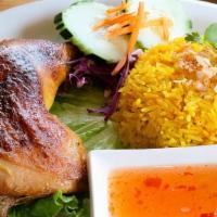 Thai Chicken Biryani · Grilled chicken thigh marinated in spices, served with Thai-curried rice and cilantro spicy-...
