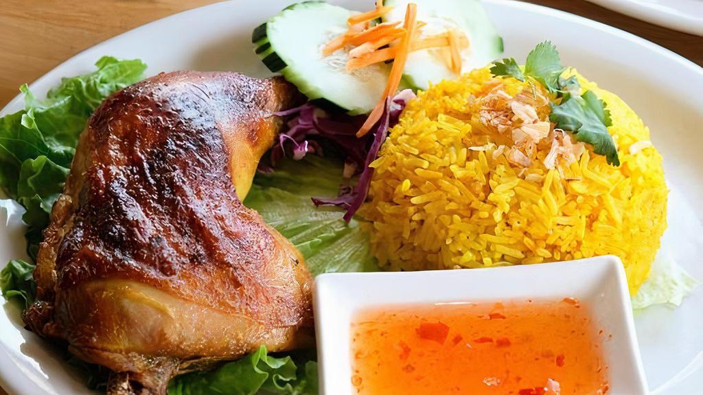 Thai Chicken Biryani · Grilled chicken thigh marinated in spices, served with Thai-curried rice and cilantro spicy-lime dipping sauce.