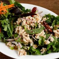 Chicken Larb · Boiled minced chicken, red onion, green onion, cilantro and mint tossed in chili-lime dressi...