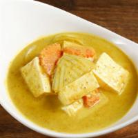 Yellow Curry (served with jasmine rice) · Steamed potatoes, onion, carrots in mild yellow curry coconut sauce.