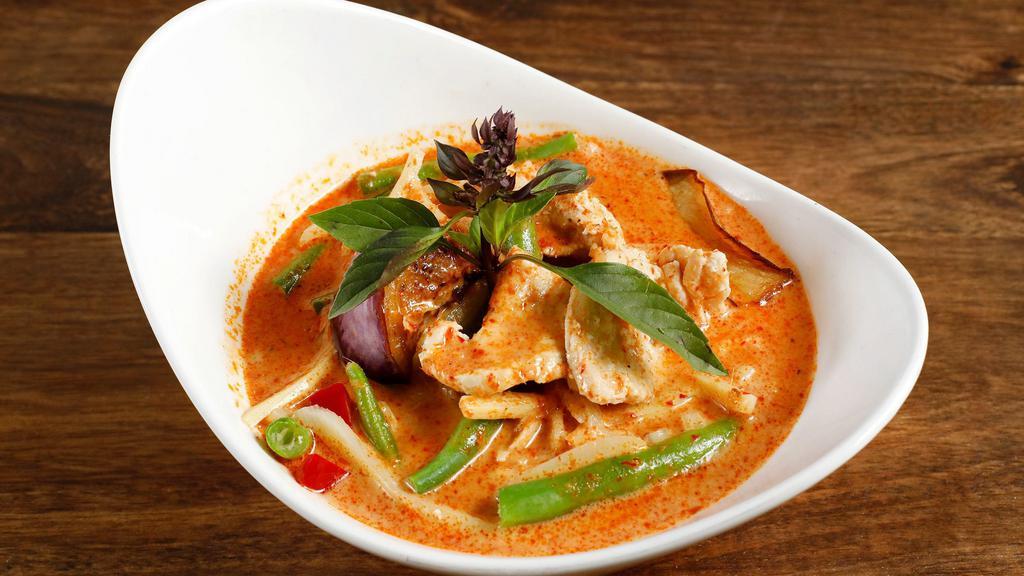 Red Curry (served with jasmine rice) · Eggplant, bell pepper, carrot and basil in spicy red curry coconut sauce.