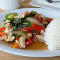 Basil (served with jasmine rice) · In a wok - Bell pepper, onion, jalapeno and basil with basil sauce.
