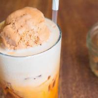 Thai Tea Float · Thai Tea Ice cream floated on Thai Iced Tea