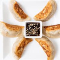 Sweet Potato Potstickers · Gluten-free potstickers filled with sweet potato, fresh garlic, and fresh ginger. Pan fried ...