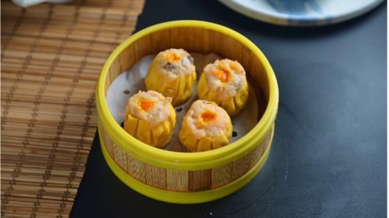 Crab Roe Shiu Mai · Classic and the iconic steamed open dumplings filled with smooth pork & shrimp paste. Contains Shellfish.