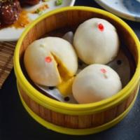 Steamed Egg Yolk Lava Bun · Classic salted egg yolk lava buns with fluffy flour skin.