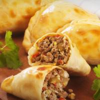 Empanadas · Home baked pastry filled with your choice of beef or chicken.