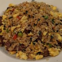 Arroz Chaufa De Carne · Peruvian style fried rice mixed with chopped beef, scramble eggs, green onions, red bell pep...