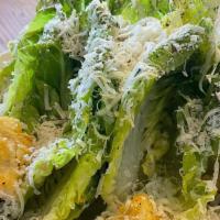 Lil' Gem Ceasar · Little Gem lettuces, grana padano, house made dressing and croutons. (dressing contains anch...