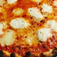 Brooklyn Pie · The Brooklyn pie - red sauce, ricotta, fresh thyme, extra virgin olive oil, and finished  