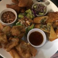 Sampler · Combination of fried sweet potato, spring rolls, curry puffs, shrimp rolls, and fried calama...
