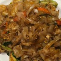 Pad Kee Mao (Drunken Noodles) · Medium Spicy .Pan fried rice noodle with your choice of meat, eggs, chili, onion, basil, bel...