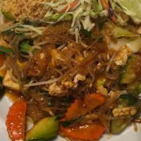 Pad Thai · Thai rice noodles sautéed with your choice of meat, eggs, tofu, and bean sprout, chive toppe...