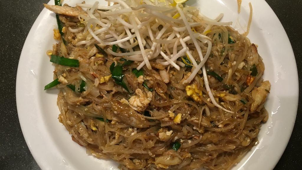Crab Meat Fried Noodle · Medium Spicy . Thai rice noodles stir fried with real crab meat, garlic, egg, bean sprout, onion and spicy chili sauce.
