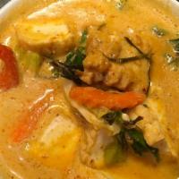 Panang Curry · Medium Spicy. Choice of meat cooked with bell pepper, zucchini, carrot, and Thai basil in pa...