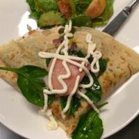 Salmon Delight Crepe · Smoked salmon with ranch, mayo, lettuce, tomato, cucumber, spinach,red onion and pesto sauce.