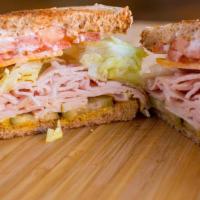 Basic 33rd · turkey, cheddar cheese, lettuce, tomato, pickled onion, pickles, deli mustard and herb aioli...