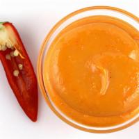 Extra Sriracha Aioli on the Side · Creamy and spicy. Allergens: Soy, Egg. Gluten-free.