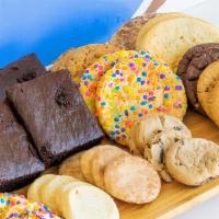 Sweet Sampler · 12 assorted cookies, 24 assorted mini cookies, four brownies. 5,400 - 5,600 calories per pack.