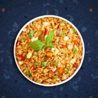 Freddy Fried Rice · Stir fried rice with egg, tomato, onion, scallion, carrot and Chinese broccoli.