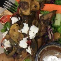 Sautéed Fresh Vegetable Salad · House salad with sautéed marinated mushrooms, bell peppers, zucchini, and onions with goat c...