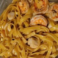 Seafood Plate · With Prawns and Sea Scallops in a Sherry Cream Sauce over Fettuccini.