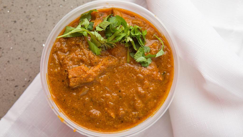 Andhra Chicken · Boneless tender pieces of chicken marinated in chef's homemade masala.