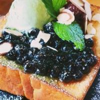 Uji Matcha Lava Toast · Buttery Brick Toast serves with Homemade Red Bean Paste, Toasted Almond, Matcha Ice Cream, B...